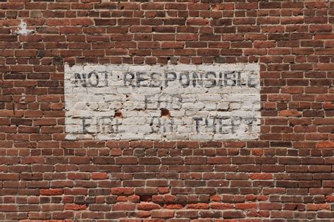 Brick Wall With Painted Sign Free Stock Photo - Public Domain Pictures