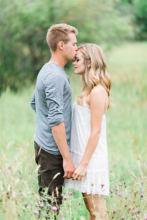 Blonde Couple In Field for Whimsical Outdoor Engagement Shoot