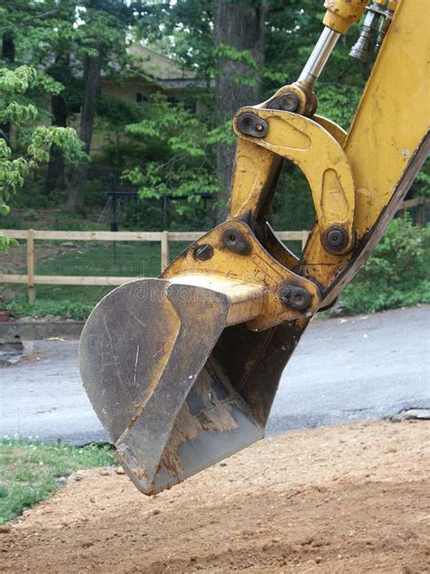 Backhoe Digging Dirt Royalty Free Stock Images - Image: 2748419