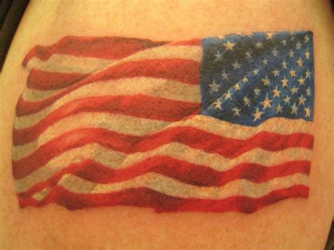I'd love this flag tattoo on my forearm!!! | Flag tattoo, American flag tattoo, Patriotic tattoos
