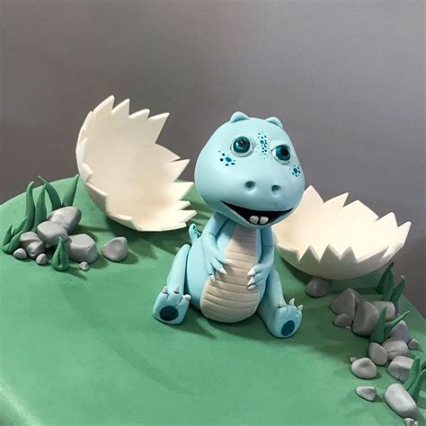 Baby dino baby shower cake | Dino baby shower, Dinosaur birthday cakes ...