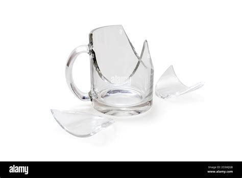 Broken glass cup isolated on white background Stock Photo - Alamy