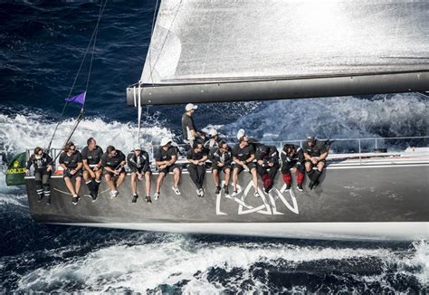 Crew of Ran 2 yacht sitting on the rail - Photo by Rolex Kurt Arrigo — Yacht Charter ...