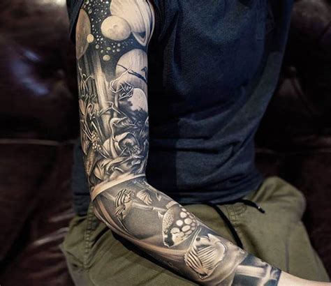 Black and grey sleeve tattoo by Khan Tattoo | Post 15311