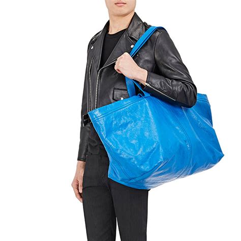 Balenciaga sells £1,705 version of IKEA's blue tote bag worth 40p - architecture and design