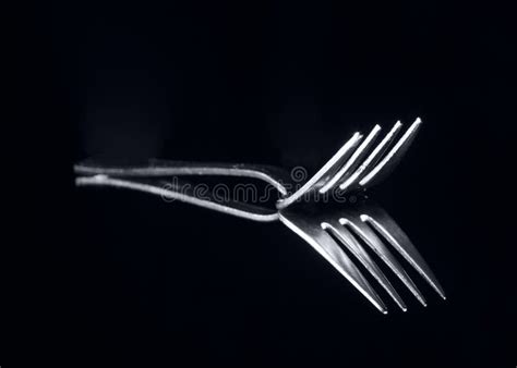 Silver Metal Spoon and Fork on the Black Background Stock Image - Image of tool, design: 28393547