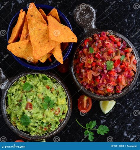 Homemade Salsa and Guacamole with Corn Chips Stock Photo - Image of ...