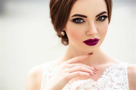 A bride wearing plum-colored lipstick. Wedding Hairstyles And Makeup ...