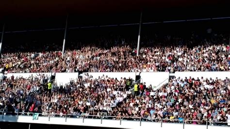 Crowd wave going round the Olympic Stadium at Springsteen concert ...