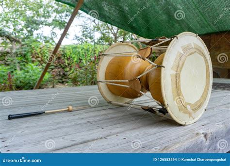 The Janggu or Janggo Traditional Korean Drum with Beating Sticks on the Wooden Table. Stock ...