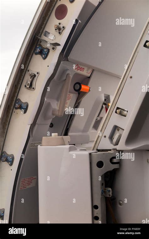 Open aircraft front passenger door, seen from the inside, showing locking mechanism etc., on an ...