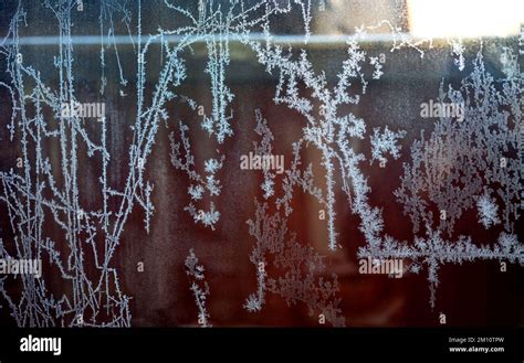 frost patterns on glass Stock Photo - Alamy