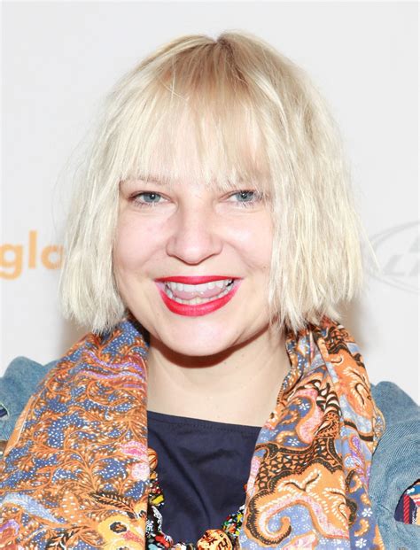 Why Does Sia Cover Her Face With a Wig? Here’s the Answer | Allure