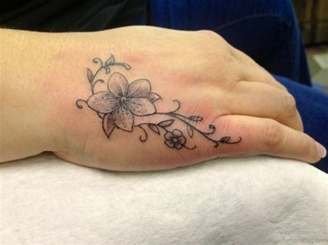 50 Cute Flower Tattoos On Hand - Tattoo Designs – TattoosBag.com