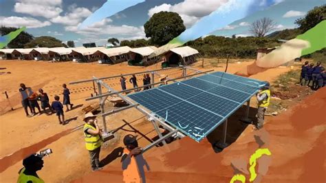 Low aerial shot of people setting up a solar panel system in a remote village