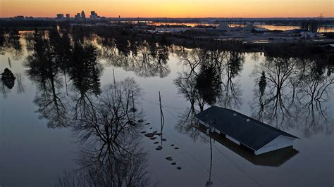 Climate change threatens millions of American homes with flood, fires