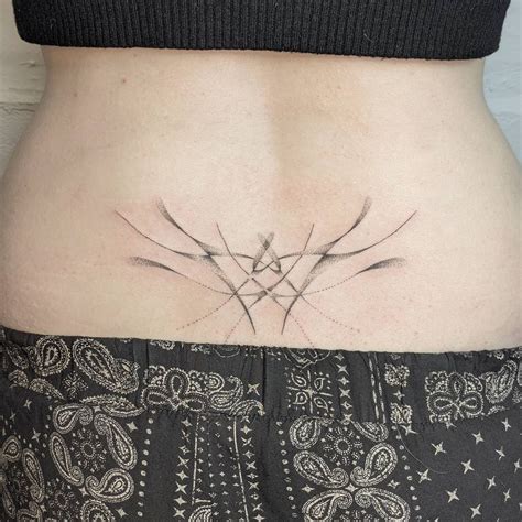 Interesting Lower back tattoos for women