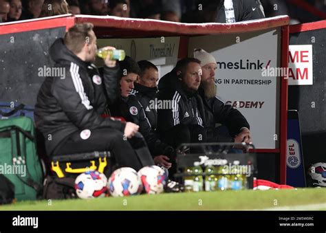 Crawley Town FC Co Owner Preston Johnson (R) sitting in the dug-out ...