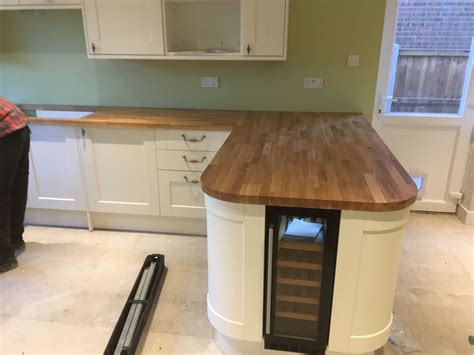 Oak breakfast bar with wine cooler | Kitchen inspirations, Kitchen ...