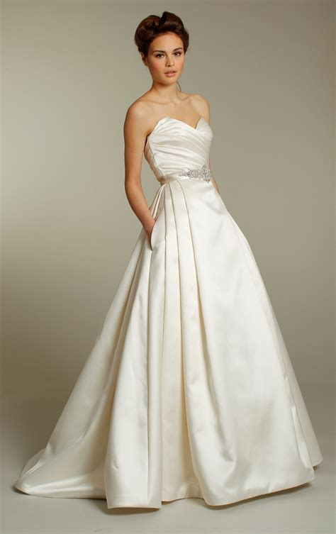 Classic ivory silk a-line wedding dress with embellished sash and sweetheart neckline