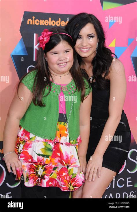 Madison De La Garza and sister Demi Lovato arriving at Nickelodeon's ...