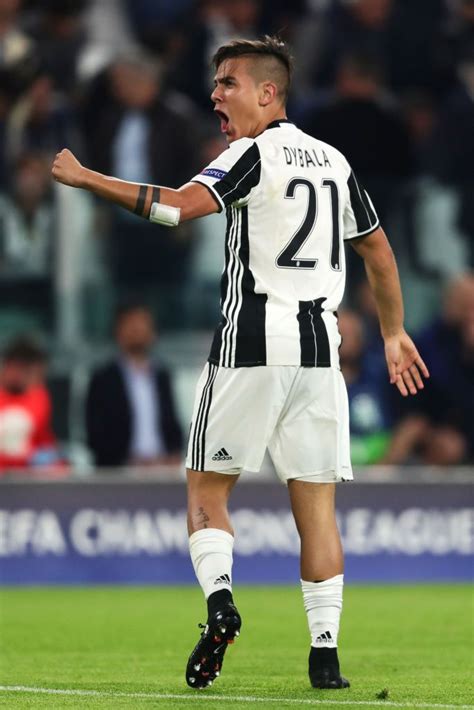 Paulo Dybala of Juventus celebrates scoring the second goal to make ...