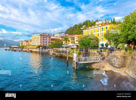 A ferry arrives at the dock in the colorful Italian village of Bellagio ...