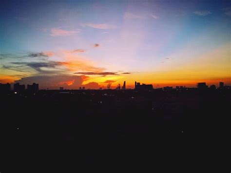 Premium Photo | Silhouette of city at sunset