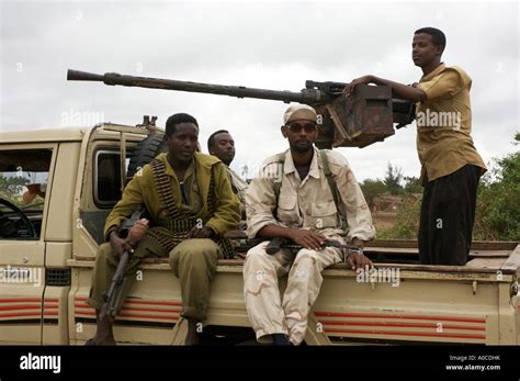 Somali militia on a Technical support vehicle fitted with 12.7mm anti ...