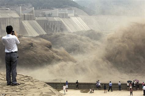 Apocalypse Dam: China's giant man-made waterfall as floodgates are opened to send millions of ...