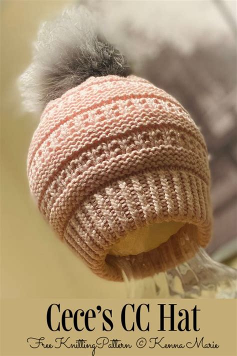 a knitted hat with a pom - pom attached to it