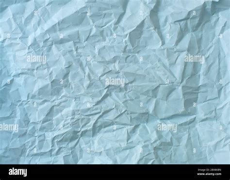 crumpled sheet of light blue paper, colored paper texture Stock Photo ...