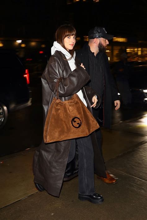 DAKOTA JOHNSON Arrives at Her Hotel After SNL Rehearsals in New York 01 ...