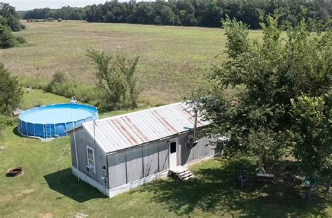 Check Out 7 Pics of a Moberly, Missouri Tiny Home with a Big Pool