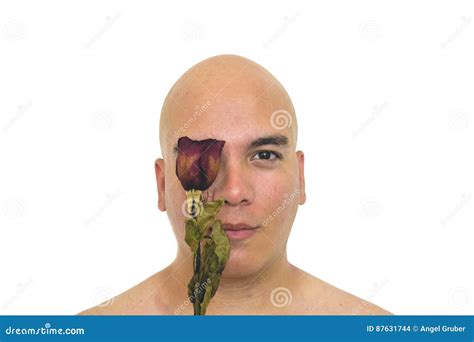 Man with a Red Rose on His Eye Stock Photo - Image of posing, mouth: 87631744