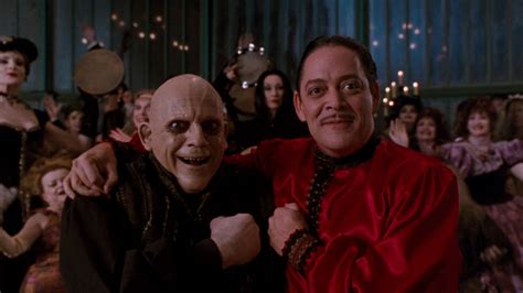 Download Happy Uncle Fester Christopher Lloyd Wallpaper | Wallpapers.com