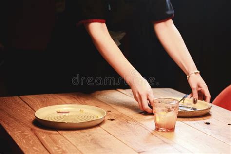 Waiter Removing Dirty Dishes from the Tables in Restaurant. Stock Photo - Image of clean, food ...