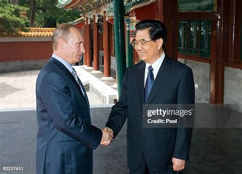 Russian President Putin Meets With Chinese President Jintao Photos and Premium High Res Pictures ...