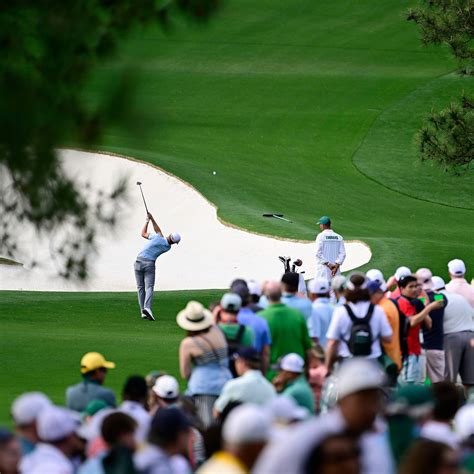 Justin Thomas plays a second stroke on the No. 8 hole during practice round 1 for the Masters at ...