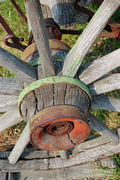 Wagon Wheel Hub - vertical Photograph by RadFab Custom Creations - Fine ...