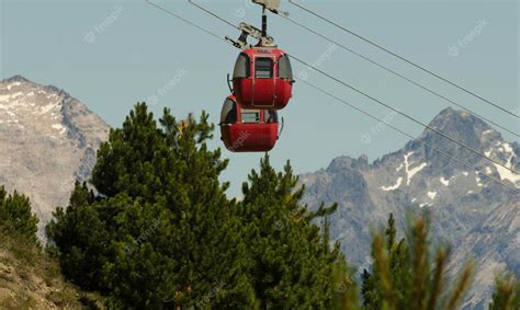 Premium Photo | Cerro otto cable car with mountains and lake in the ...