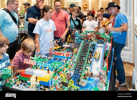 Houston, USA. 8th July, 2023. People look at a water park model built with LEGO bricks at the ...