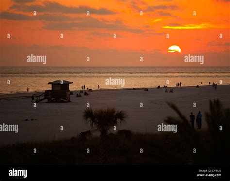 Sunset on Sarasota beach in Florida USA Stock Photo - Alamy