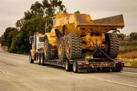 How To Safely Transport Construction Equipment?