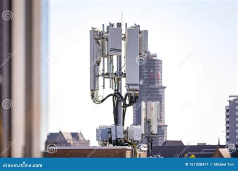 5g Mobile Tower Installation With A Clear Sky In The Background And The ...