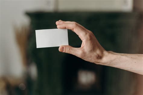 Person Holding White Blank Card · Free Stock Photo