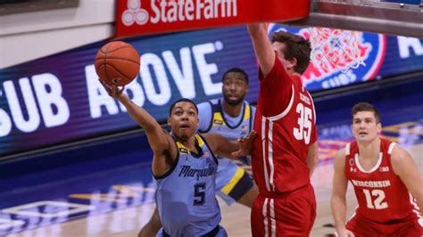 College basketball scores: Marquette upsets No. 4 Wisconsin at the buzzer - Sports Illustrated