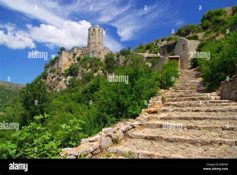 wall ruin chateau castle blue stairs tower hill europe wall ruin bosnia path Stock Photo - Alamy