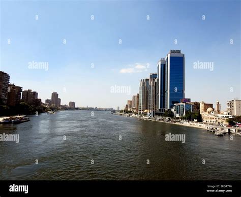 Cairo, Egypt, June 29 2023: The river Nile of Egypt with modern buildings and bridges along the ...