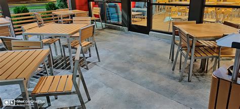 Revolutionizing Outdoor Dining: The First-Ever Concrete Overlay Patio by The Concrete Makeover